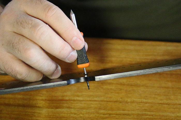 14. We smelten het tooltje door de rigruler op de gewenste onderlijnlengte.